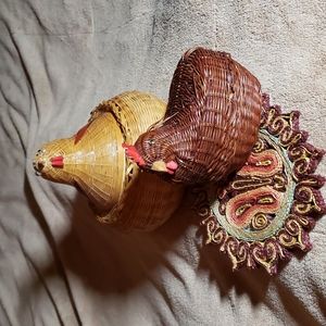 Two Sitting hen baskets and one paper trivet butterfly.